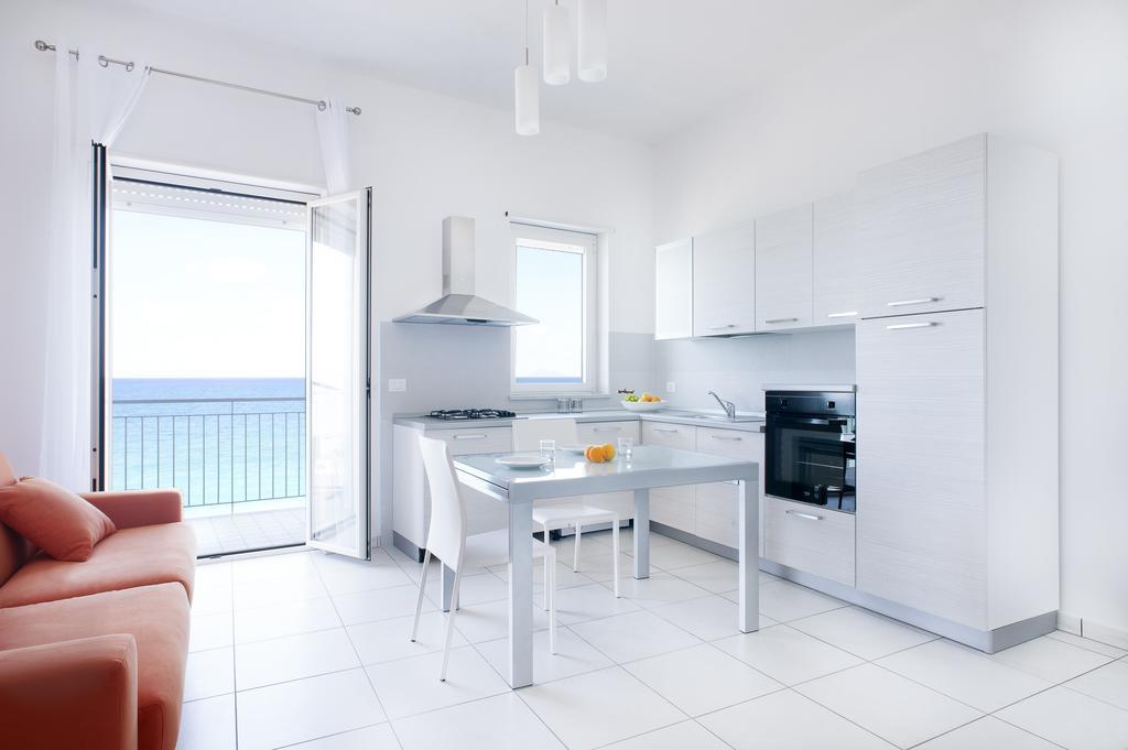 Vuelle Residence Apartments Capo dʼOrlando Værelse billede