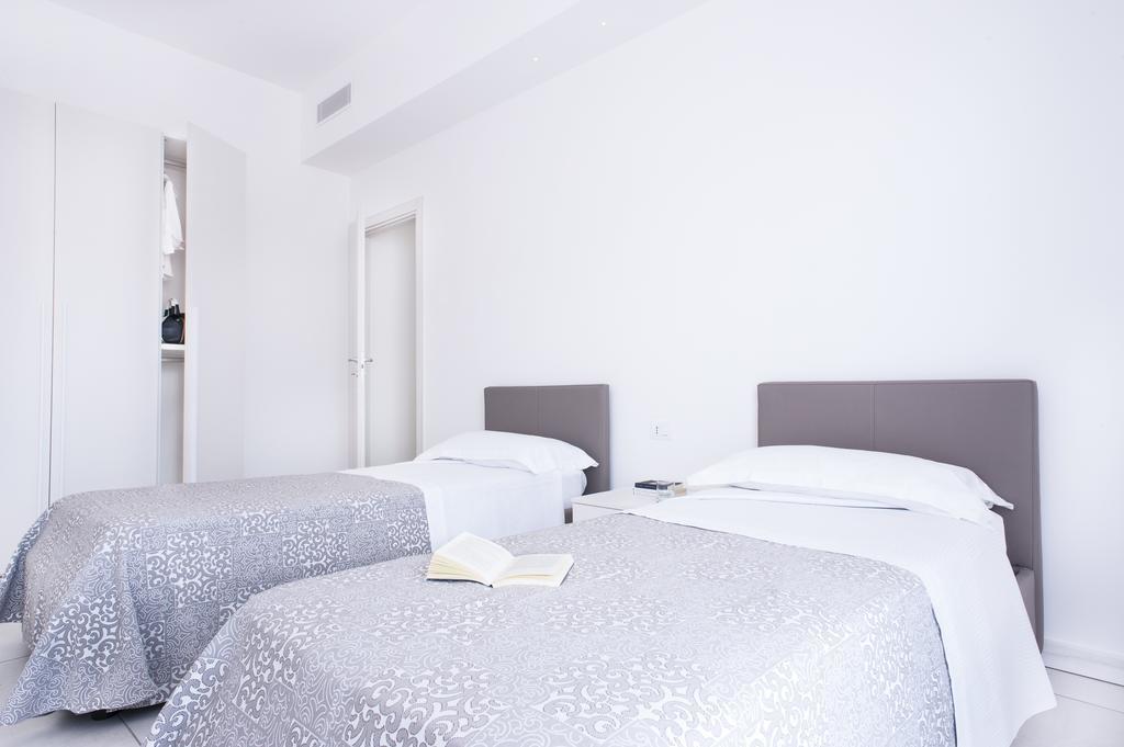 Vuelle Residence Apartments Capo dʼOrlando Værelse billede
