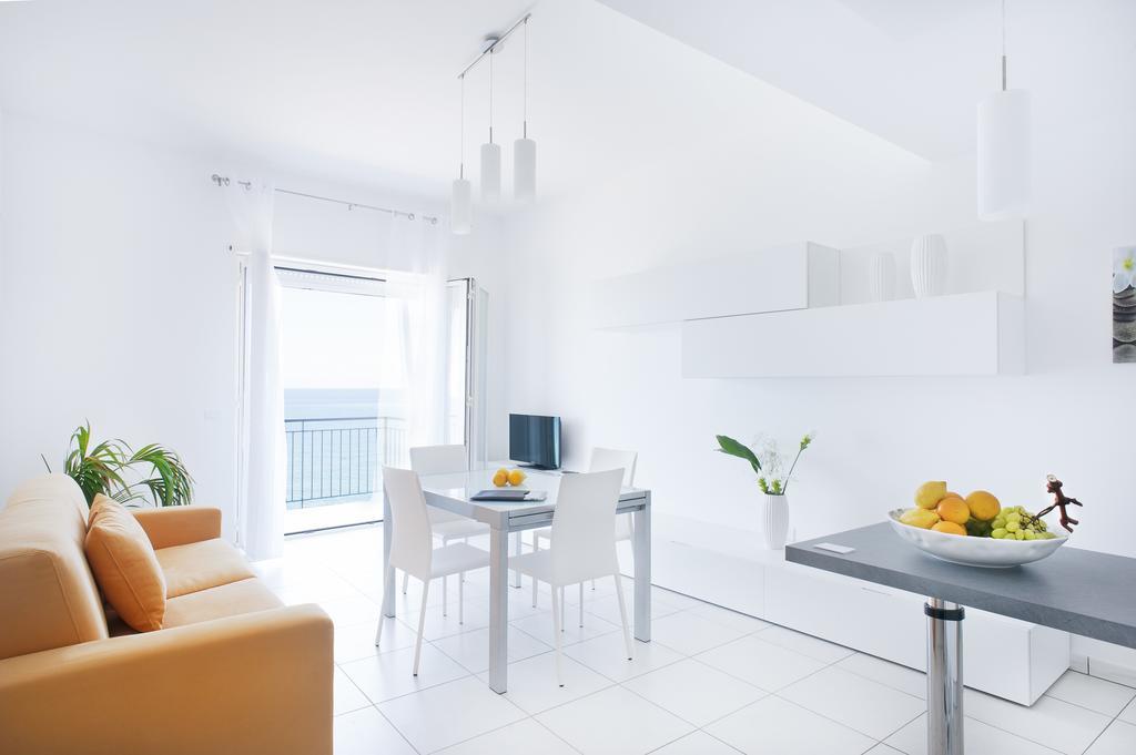 Vuelle Residence Apartments Capo dʼOrlando Værelse billede